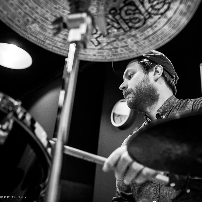 Black and white photo of drummer Hoskuldur Eiriksson